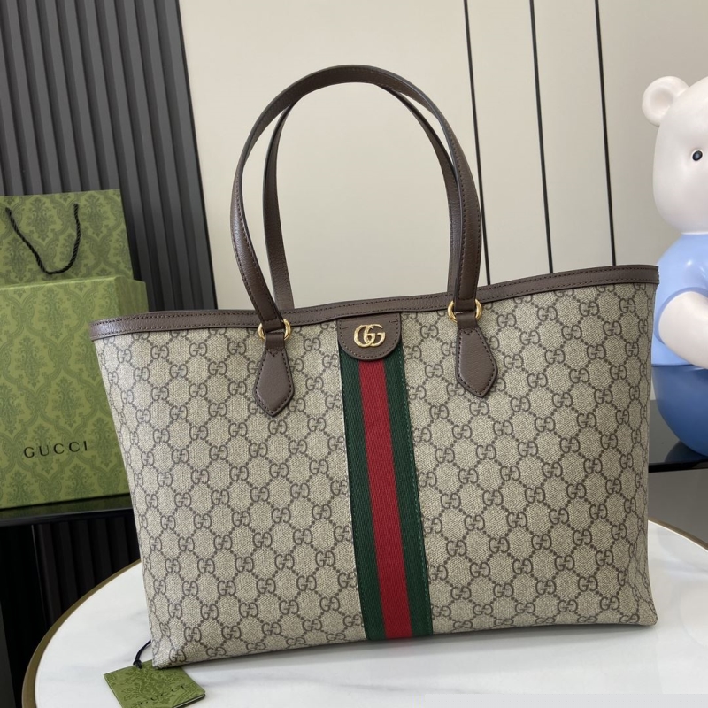 G*u*i shopping bags